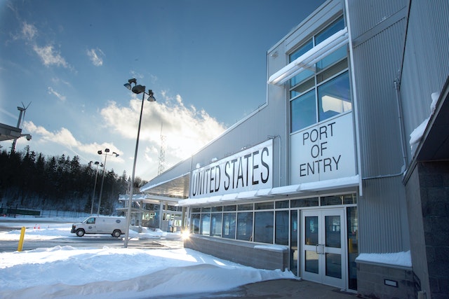 United States port of entry building with snow