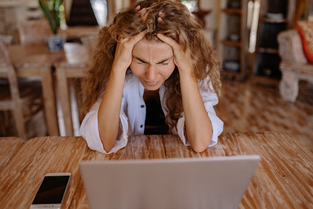 stressed woman at computer